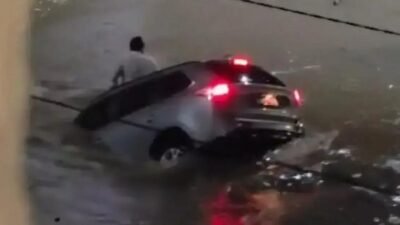 Enfermeiro resgatado após carro cair em canal durante chuvas em Vitória da Conquista
